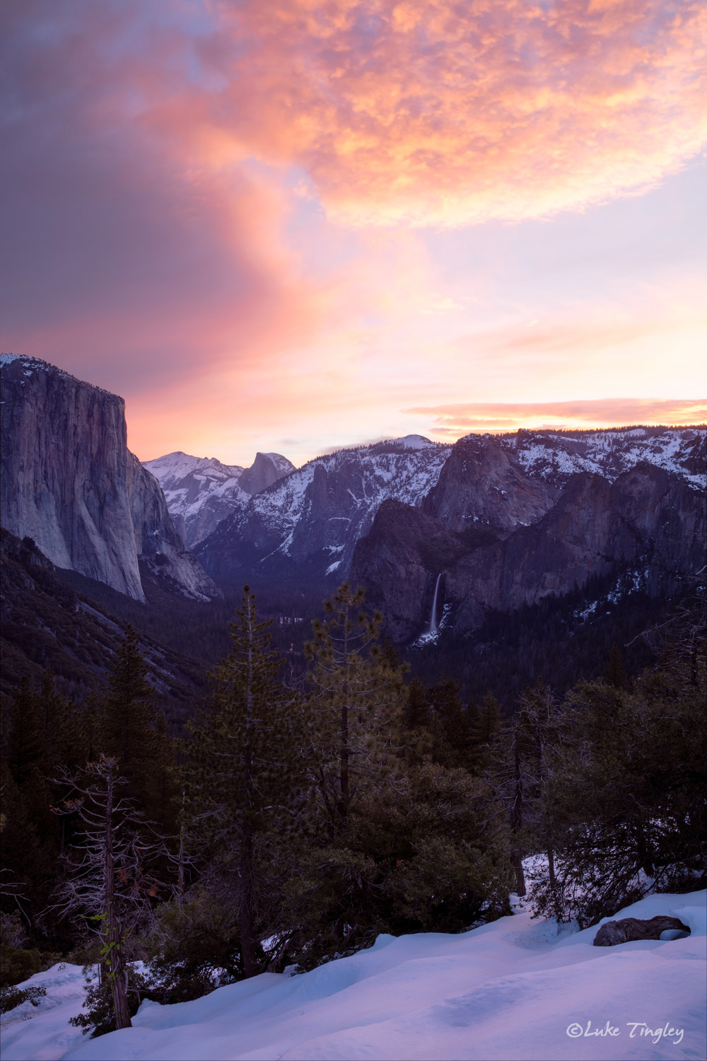 Sunrise on the front edge of a massive snow storm that would dump enough snow to completely shutdown Yosemite National Park for...